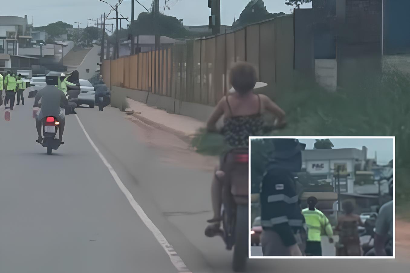 mulher sem capacete tenta desviar de blitz