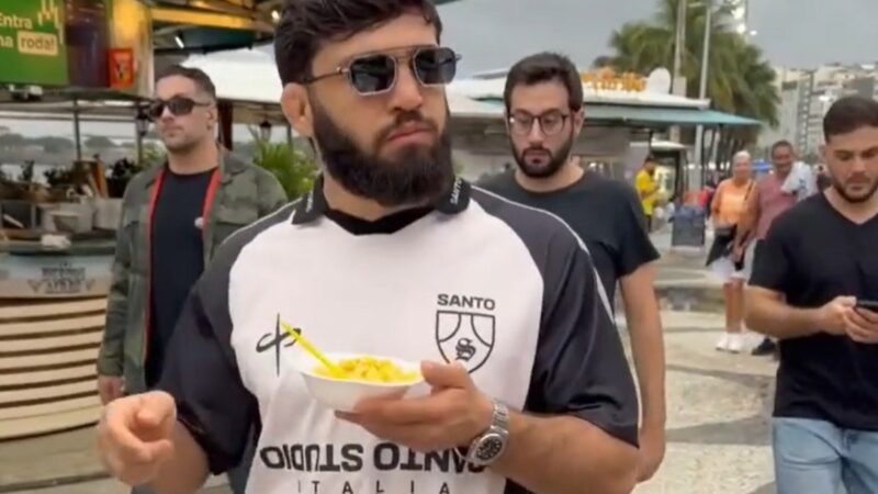 VÍDEO: Lutador do UFC vira “carioca por um dia” e aparece comendo milho em pratinho de isopor no Rio