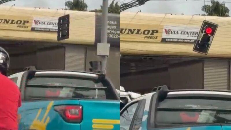 Motorista grava semáforo girando e pendurado apenas por fio em Cuiabá; veja vídeo